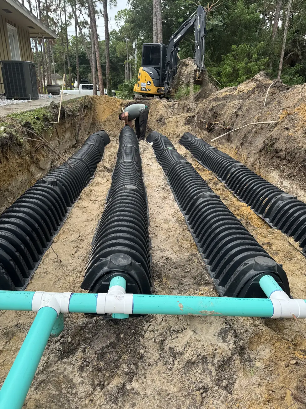 Drain field chambers tied into the distribution header